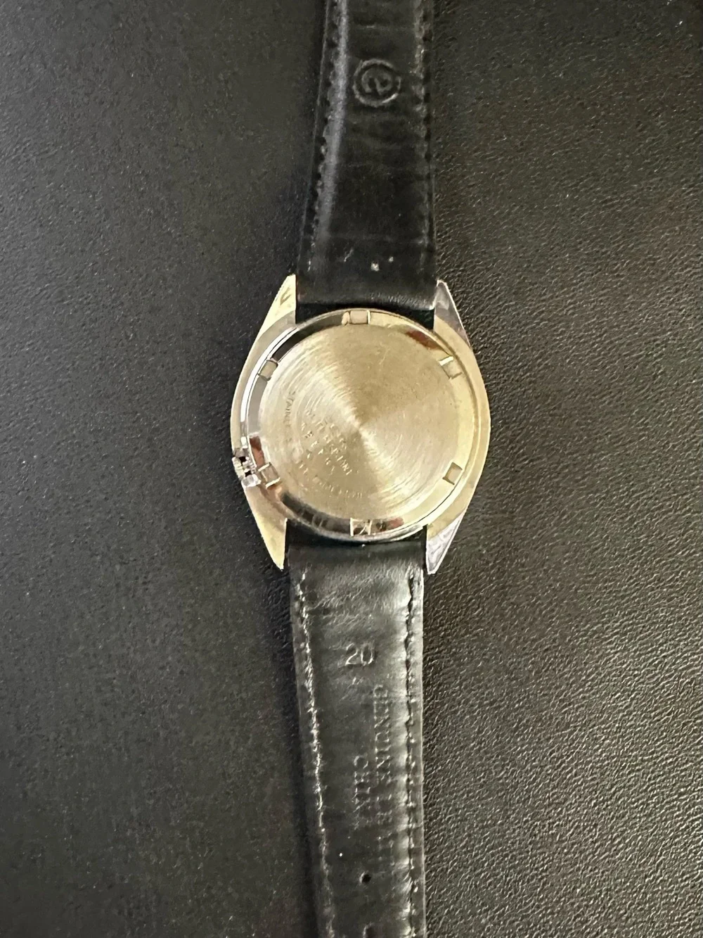 Seiko Black Dial Watch with Orange and Gray Accents